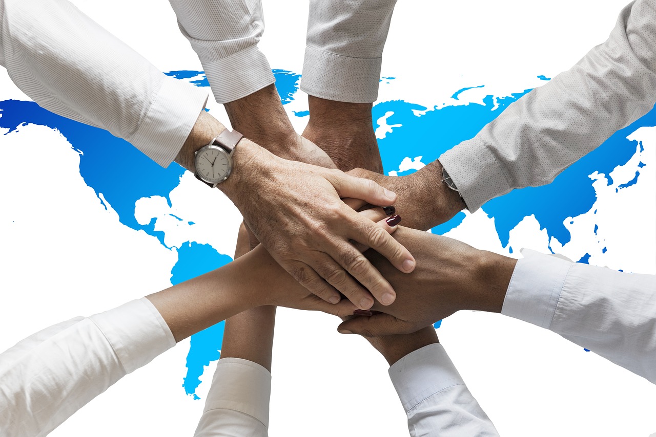 A team joining hands